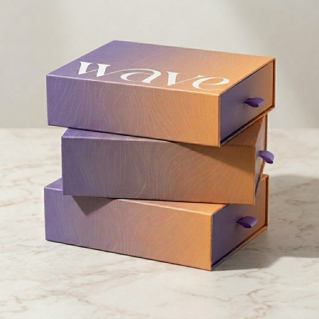 Stack of Wave branded gift boxes