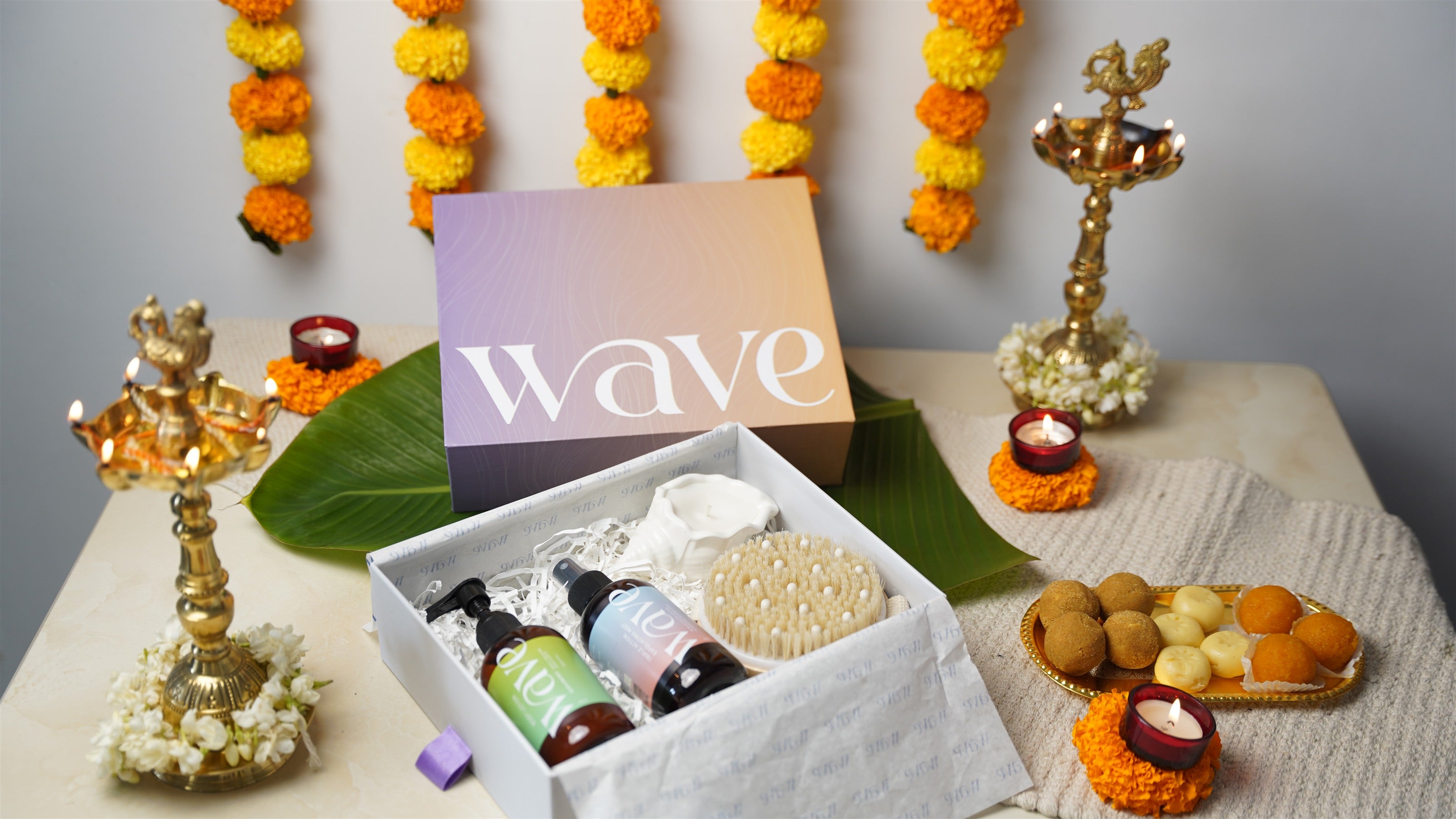 Open Wave gift box with full-size bodycare and a dry brush